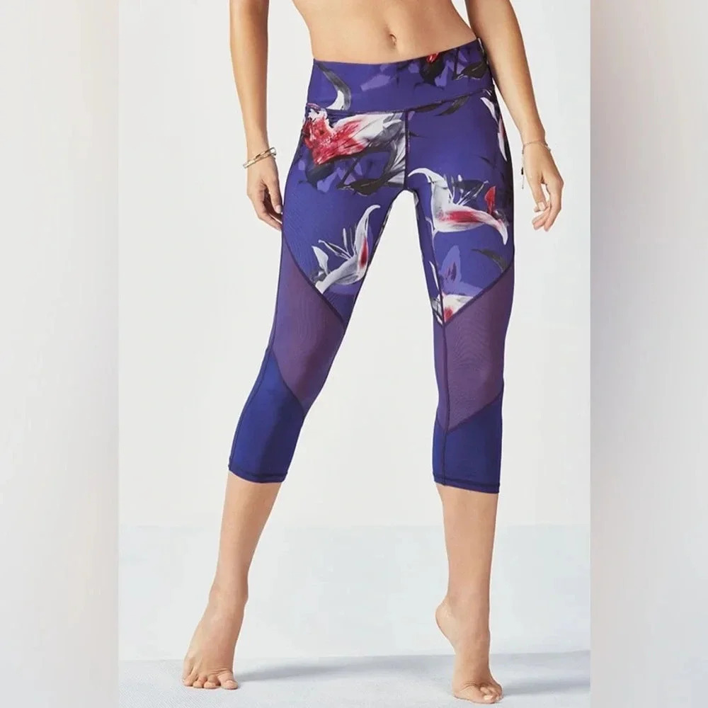 Fabletics Mid-Rise Mesh Powerhold® Capri Workout Leggings in Midnight Lily M